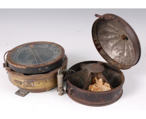 A WW II R.A.F. Lancaster Bomber Type P4A flying compass, serial no. 254331 with Air Ministry label, together with a Hudson's 