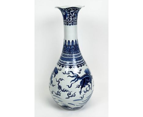 CHINESE BOTTLE VASE, Kangxi style, decorated with a Buddhist lions and deer with shaped lip, 79cm H. 