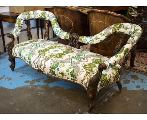 SOFA, 81cm H x 193cm, mid Victorian walnut, newly upholstered in animal print fabric on ceramic castors. 