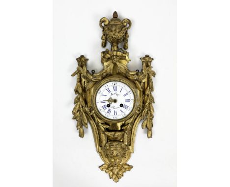 CARTEL CLOCK, 19th century Louis XVI style ormolu urn finial above enamel face with swags and mask detail, 60cm H x 30cm W. 