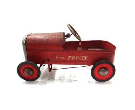 A Triang tin plate 'Royal Prince' pedal car, red, 75cm long.