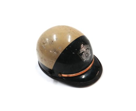 A mid 20th century green and cream  'Marshall' motorcycle helmet.
