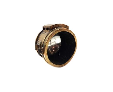 An eight inch brass cased 'Rushmore' automobile searchlight, lacking front glass.