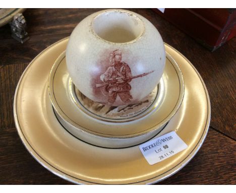 A Macintyre & Co pottery match striker with WW1 soldire design to front by Woodville with Rudyard Kipling poem to rear, toget