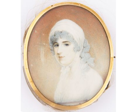 Oval framed, unsigned, late 18th Century portrait miniature on ivory, bust length portrait of a lady with powdered hair with 