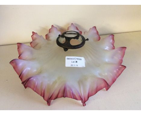 A Victorian cranberry fluted edge lamp shade.