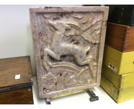 A large ceramic Art Deco tile.