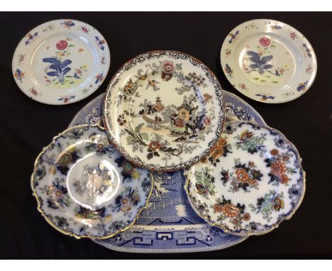 Lot to include a selection of ceramic plates and a blue and white ceramic dish.