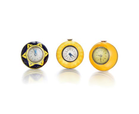 With golden yellow and navy blue enamel, having a mechanical movement with manual winding, round dials with Arabic numerals; 