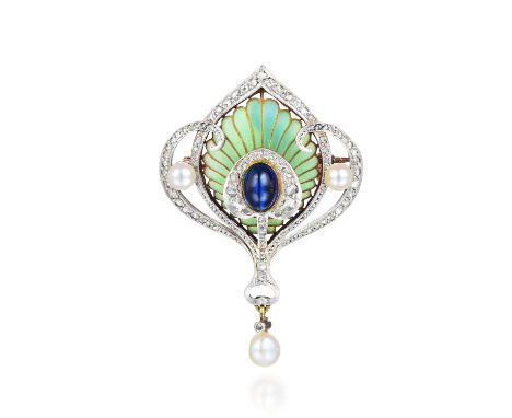 Crafted out of 14K gold with a platinum top, featuring an oval-shaped cabochon sapphire, weighing approximately 1.85 carats, 