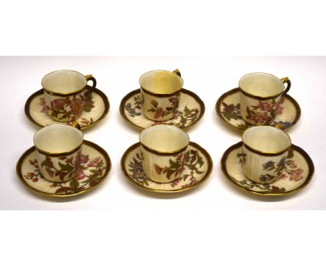 Group of six Worcester cups and saucers, the blush ground body decorated in flowers with gilt handles and Worcester factory m