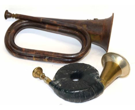 Military style bugle bearing the crest of the Royal Engineers, together with one other (2)   