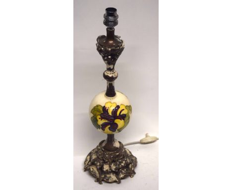 Moorcroft lamp, the ceramic body with a Hibiscus or Anemone design on white ground, the lamp 46cm high