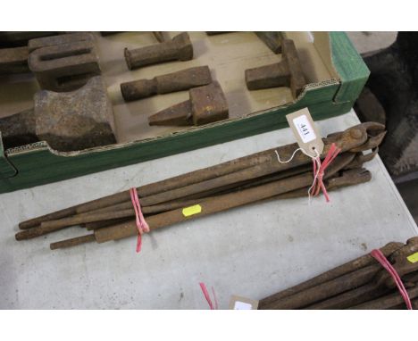 A bundle of various blacksmith's tools to include pincers etc.