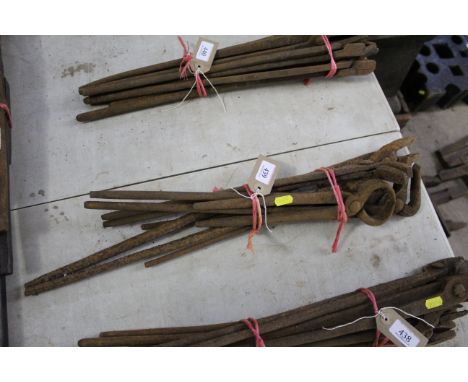 A bundle of various blacksmith's tools to include pincers etc.