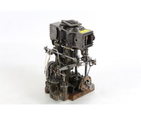 A part built model steam engine, approx. 6&frac12;" high x 5" wide x 5" deep