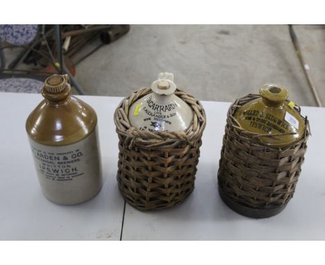 Three stoneware flagons, two in wicker baskets and one with a lid named to A Miller and Sidgwick Ltd., A. Arden &amp; Co. P.B