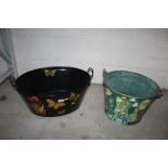 A decoupage galvanised bath and a decoupage pail