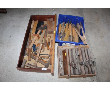 Three boxes containing various wood working tools to include measures, moulding planes, brushes, drawing instruments, chisels