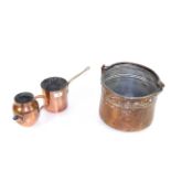 A small coppered bucket with metal swing handle, a small coppered pot with pouring spout and a