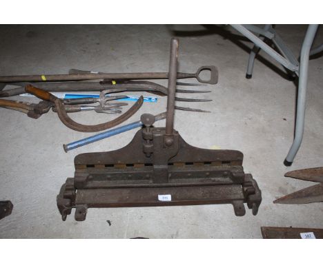 A vintage sheet metal bender