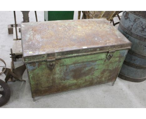 A large metal storage trunk with twin handles and twin metal clasps with three fitted interior trays