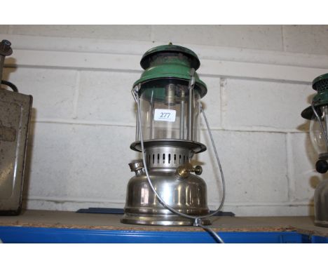 A Primus 1020 Tilley like lamp, nickel plated base, green top with a hanging device, no glass but with a Perspex infill