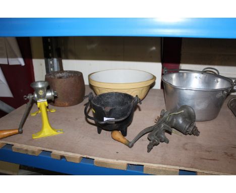 A quantity of kitchenalia to include jam pans, iron handled saucepan, two mincers and a monument cast iron glue pot