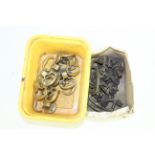 Two boxes of brass furniture fittings