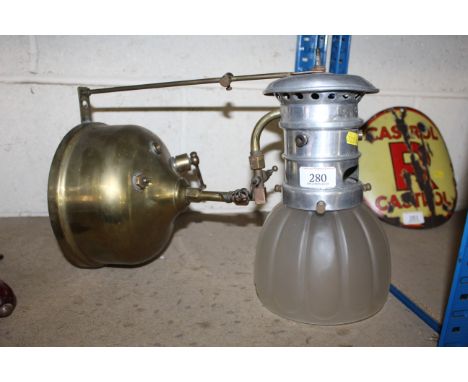 A wall hanging paraffin / petrol Tilley like lamp with brass font and believed to be French