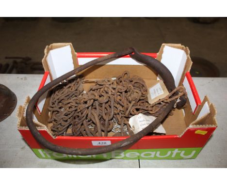 A box containing a quantity of various vintage chain, a cow collar and a 6ft dog chain etc.