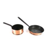 An early copper frying pan with metal handle and a copper saucepan with metal handle