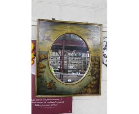 A large framed oval mirror with duck painted surround, approx. 30&frac12;" x 34&frac14;"