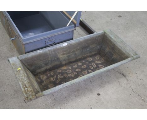 A galvanised trough, approx. 20" x 44"