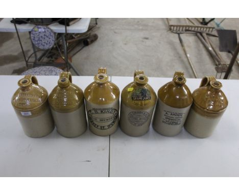 Six stoneware flagons all with handles named to Blogg &amp; Cullingham, E. Bloomfield, C.B. Kirby, R. Crook &amp; Co., R.G. B