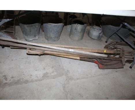 A quantity of wooden long handled gardening tools to include prong cultivators, spade, forks, hoe etc.
