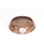A copper and cast iron dogs drinking / feeding bowl