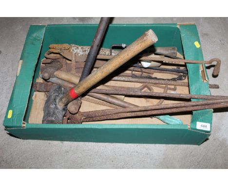 A box containing a quantity of blacksmith's tools to also include a wooden handled sledge hammer, a medium ball-pein hammer e