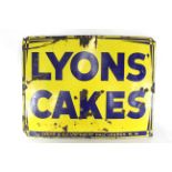 An enamel sign on rolled iron base for "Lyons Cakes", approx. 39" x 29½"