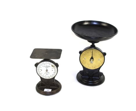 A Salters Family Scales No. 150 to weight 14lbs with a brass face, and a Salter No. 25 set of balance scales