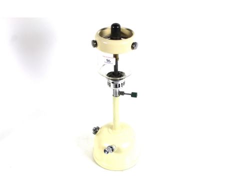 A Vapalux table lamp with cream base 