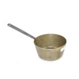 A medium size brass jam makig saucepan with a ste