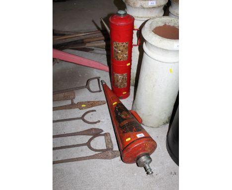 A vintage Minimax Fire Extinguisher of Feltham, Middlesex and one other vintage fire extinguisher both converted to electrici