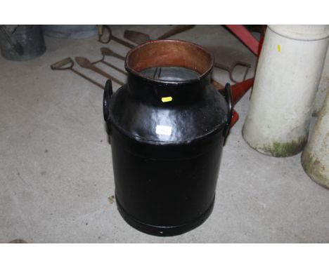 A black painted twin handled milk churn (lacking lid)