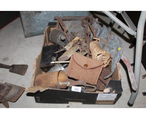 A box containing a quantity of various metalware to include measuring jugs, blow torch, measuring chain, cased boxed camera e