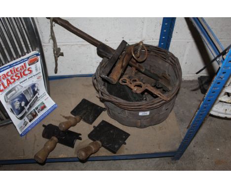 A quantity of horse related items including grooming items, a horseman's nose twitch, horse bits and chain, a horse lawn boot