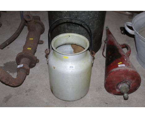 An aluminium milk churn with swing handle