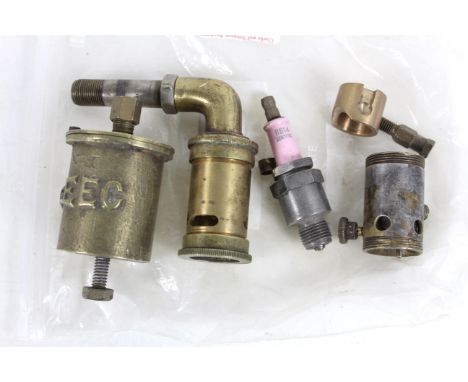 A quantity of steam engine whistles etc. and a spark plug
