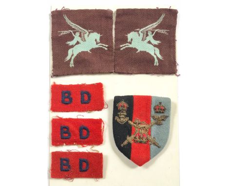 WW2 Airborne Forces pair of printed Pegasus cloth formation signs, Bomb Disposal cloth titles etc. A good facing pair. Light 
