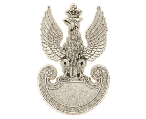 Polish Army WW2 plastic economy cap badge.A good example by A. Stanley &amp; Son, Walsall. Crowned winged eagle atop an Amazo